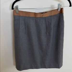 Gray wool skirt with brown ribbon trim